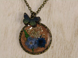 Fluttering Flora: Bronze Necklace with Queen Anne's Lace and Blue Flowers