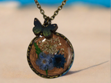Fluttering Flora: Bronze Necklace with Queen Anne's Lace and Blue Flowers