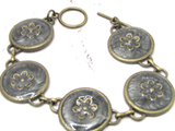 Antique Bronze Connector Bracelet with a Gold Flower
