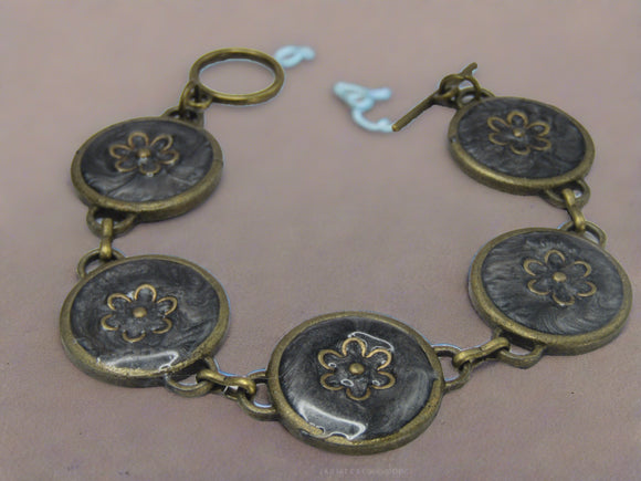 Antique Bronze Connector Bracelet with a Gold Flower