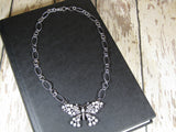Fluttering Glamour: Rhinestone and Pearl Butterfly Necklace
