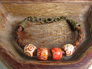 Braided Leather Bracelet with Red & Tan Wood Beads