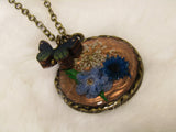 Fluttering Flora: Bronze Necklace with Queen Anne's Lace and Blue Flowers